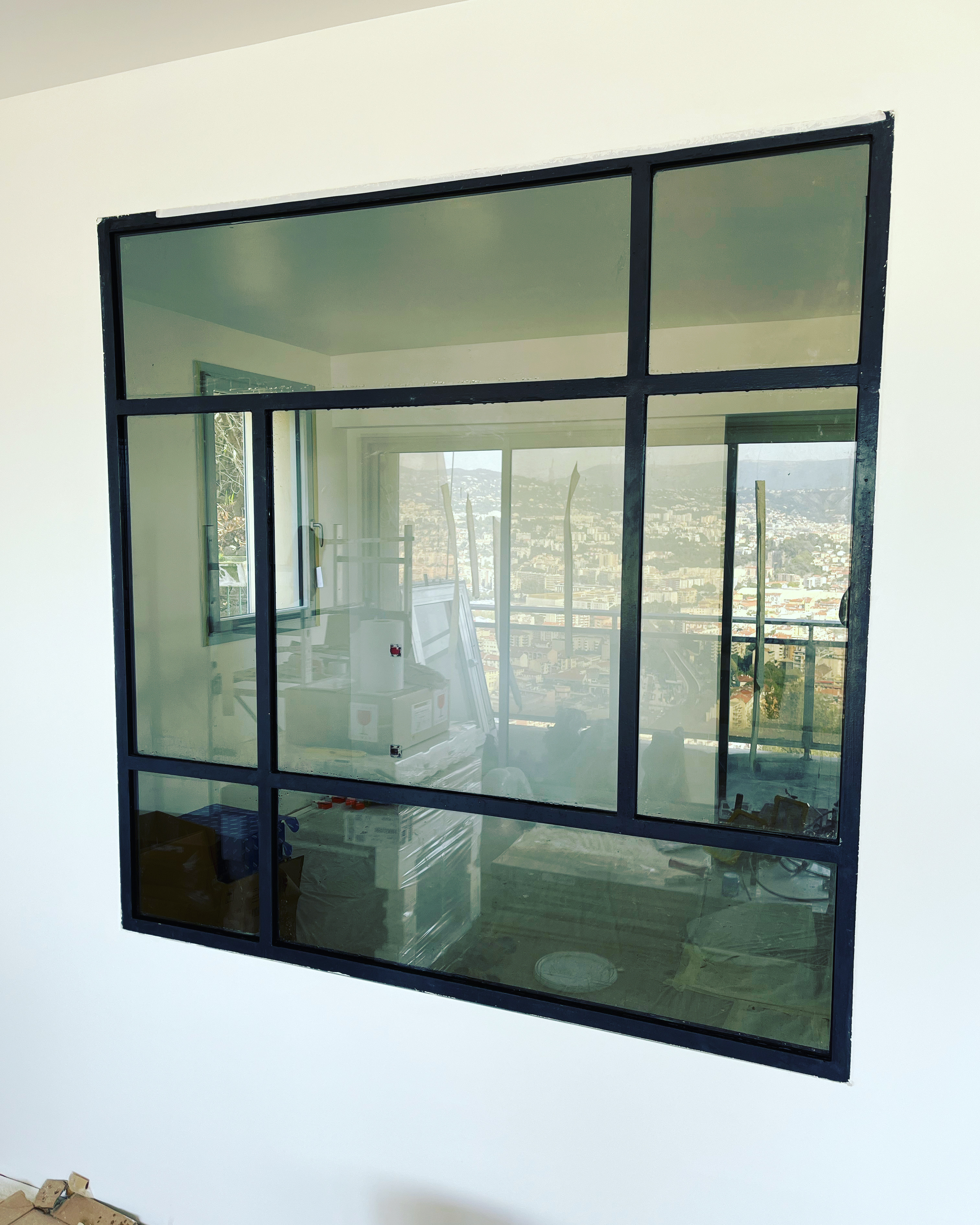 Porte vitrée en fer forgé