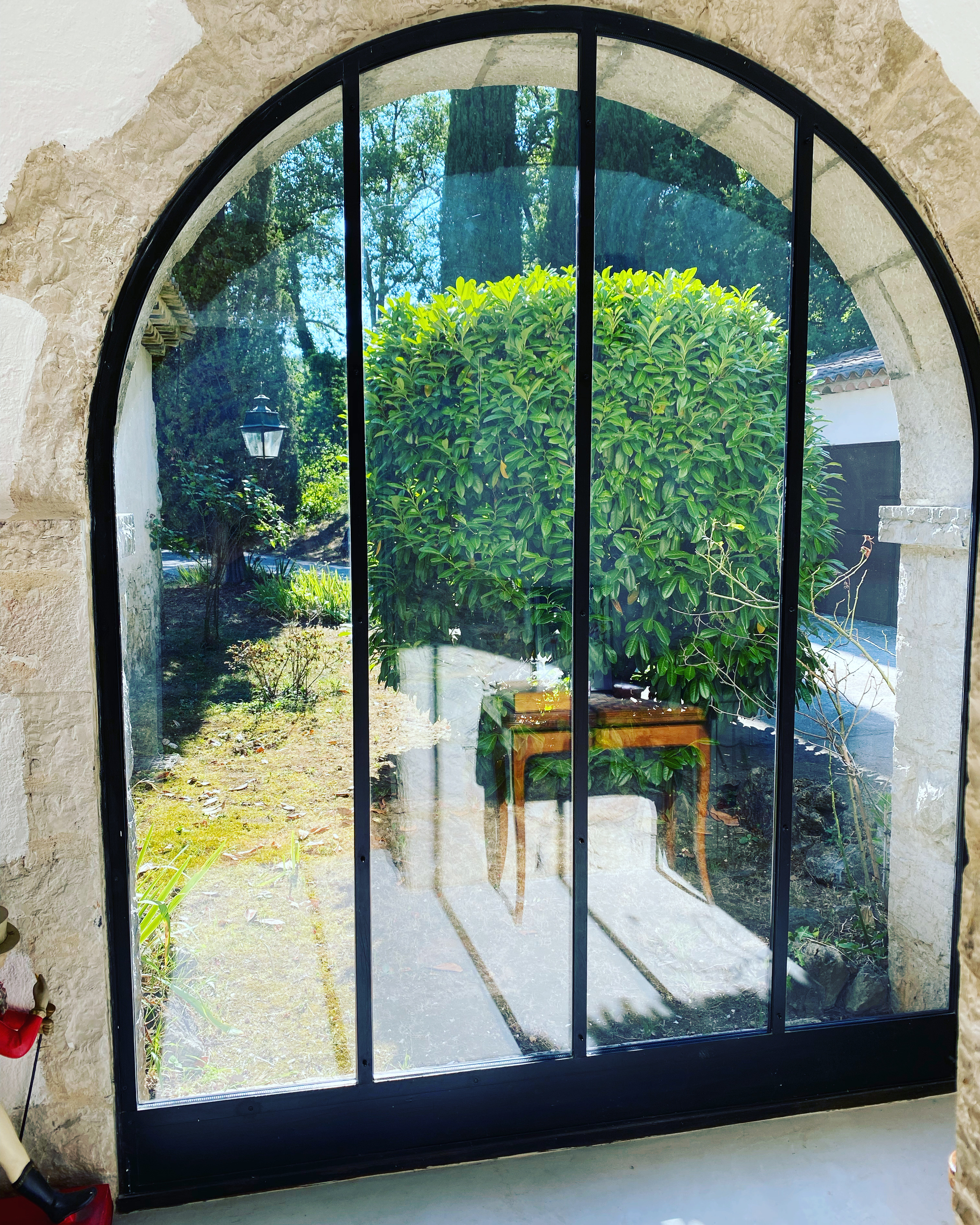 Porte vitrée en fer forgé